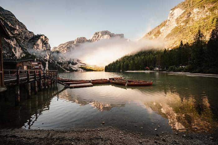 Fototapeta Boats On The Braies Lake, Pragser Wildsee In Dolomites Mountains, Sudtirol, Italy Dolomite.