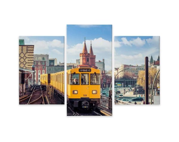 Obraz Wieloczęściowy Żółty Pociąg W Berlinie Na Torach Kolejowych